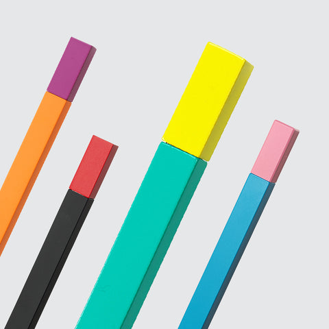 Four close up colourful refillable Tsubota Pearl two tone lighter with its slim cubed matchstick shape