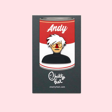 An art theme enamel pin from Chatty Feet featuring Andy, in his signature white hair, red nose and black shirt