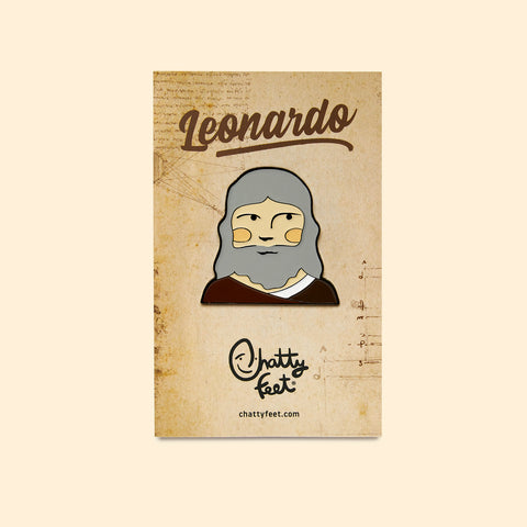 An art theme enamel pin from Chatty Feet featuring Leonardo da Vincci, with his signature beard