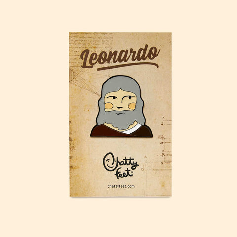 An art theme enamel pin from Chatty Feet featuring Leonardo da Vincci, with his signature beard
