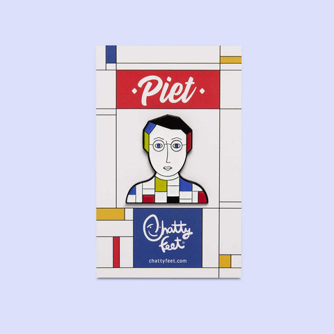 An art theme enamel pin from Chatty Feet featuring Piet Mondrian, with his signature grid base art