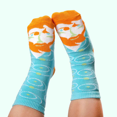 Pair of blue kid socks featuring a playful Vincent Van Gogh-Feet artist face design, adding a fun and quirky touch to everyday wear