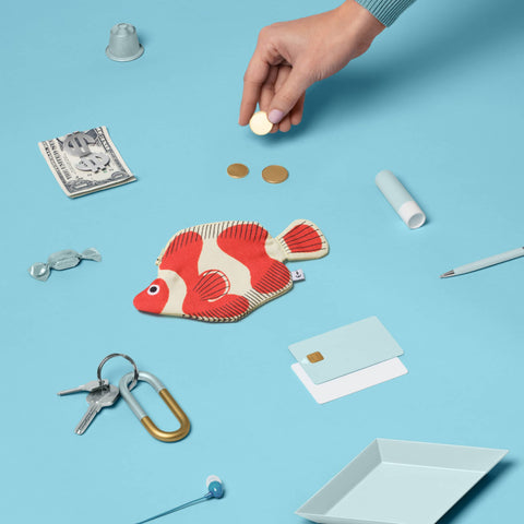 Don Fisher clown fish purse with a sea of keys, cards, sweets, cash, coins, limp bum, small items which can be fit into the purse