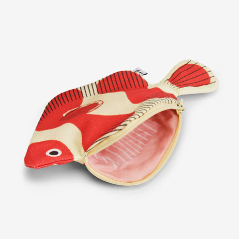 The interior view of clown fish purse which shows pink fish meat and white bones made from fabric