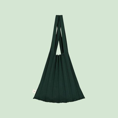 Pleatsmama Shoulder Bag Solid—deep forest green, soft pleated texture; front-facing shot highlights its elegant drape and sculptural form