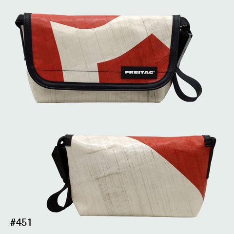 FREITAG F41 Hawaii Five-O messenger bag in offwhite with rust-red graphic, upcycled truck tarp, front and back views.
