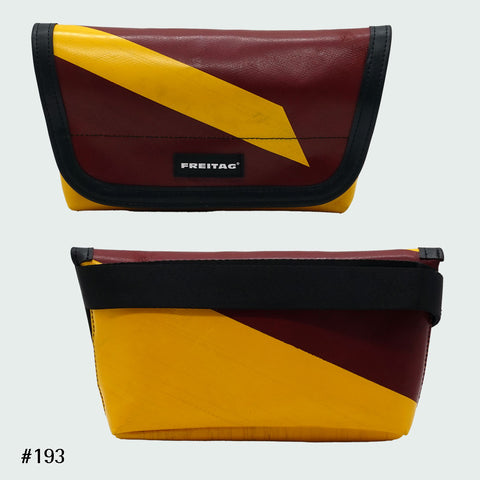 FREITAG F40 Jamie hip bag in red and yellow with diagonal graphic, upcycled truck tarp belt bag, front and back views