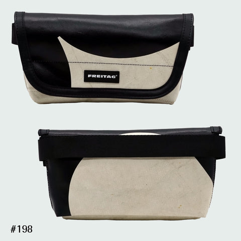 FREITAG F40 Jamie hip bag in black and white with curved graphic, upcycled truck tarp belt bag, front and back views.