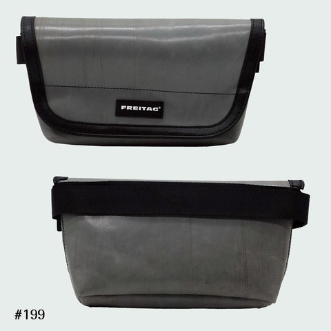 FREITAG F40 Jamie hip bag in solid grey, upcycled truck tarp belt bag with adjustable strap, front and back views.