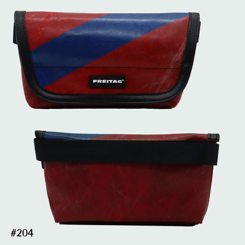 FREITAG F40 Jamie hip bag in red with navy diagonal stripe, upcycled truck tarp belt bag, front and back views.