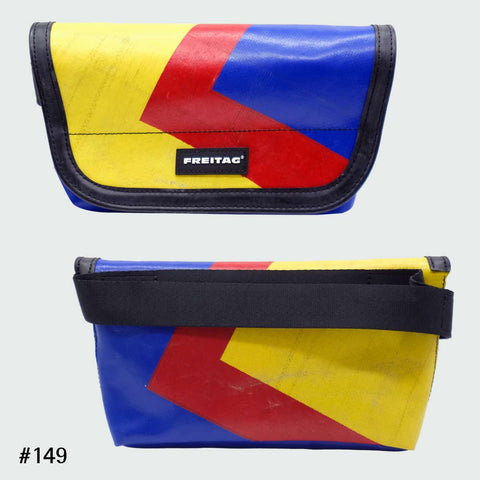 FREITAG F153 JAMIE hipbag with a glossy multicolour of yellow, red and blue tarp design