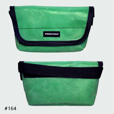 FREITAG F153 JAMIE hipbag with a weathered mint green tarp design