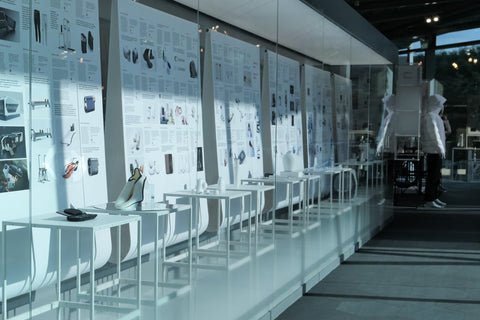 Long walkway corridor showcasing award winning prototypes and their description