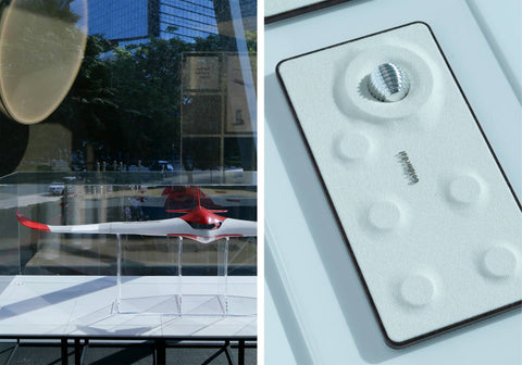 Two Concept Design winners on display behind a glass case