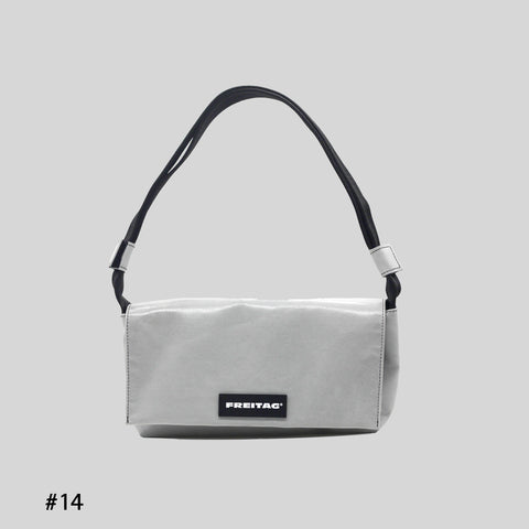 Front view of FREITAG F171 LAURA shoulder bag, grey with black strap.