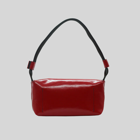 Back view of FREITAG F171 LAURA shoulder bag, red with black strap.