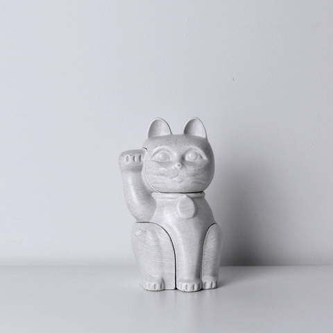 A gif showing Locknester Buddy Maneki-neko 3D printed puzzle piece together