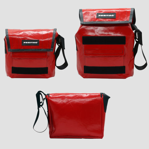Front, extended and back views of FREITAG F11 LASSIE messenger bag in red, with black trim and black strap