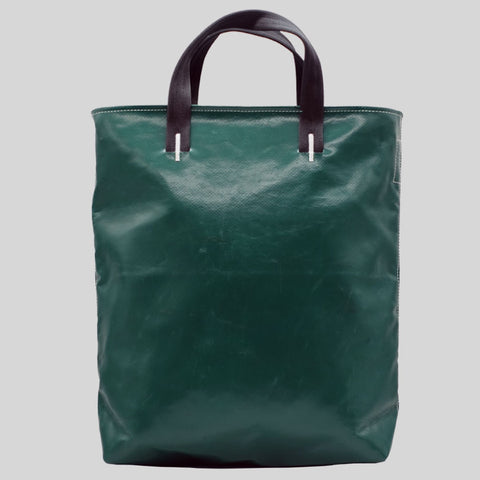 Back view of FREITAG F202 LELAND tote bag with black handles, plain dark green.