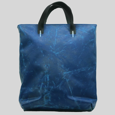 Freitag F202 LELAND tote bag back view with weathered matte blue tarp design