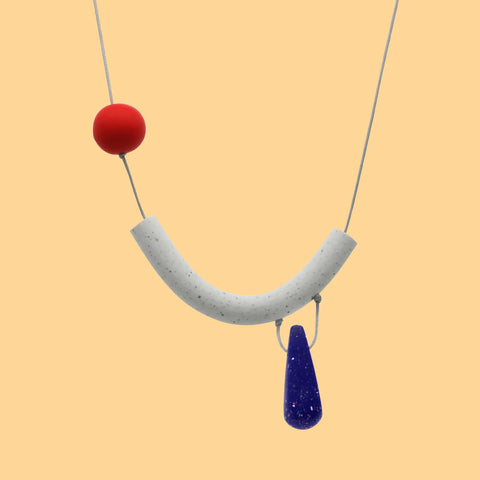 colourful polymer clay necklace on white nylon cord