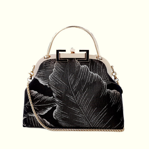 Cocoonese Clasp Crossbody Bag