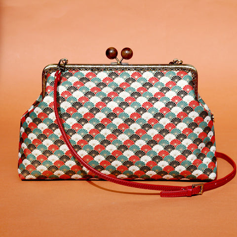 Cocoonese Clasp Sling Bag
