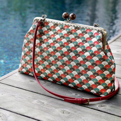 Cocoonese Clasp Sling Bag
