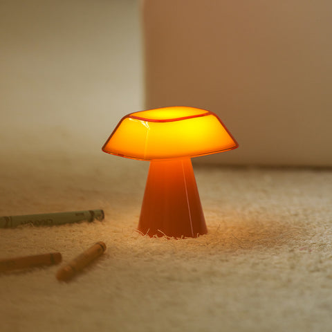 Orange Lumena Space S mood lamp with warm light