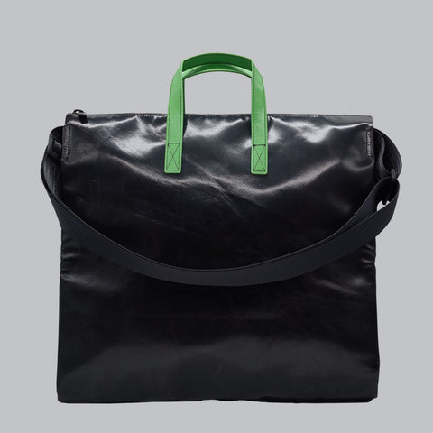Back view of FREITAG F275 TILDA tote bag in black, with green handles and black shoulder strap