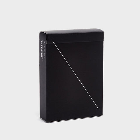 Areaware Minim Cards come in a sleek matte black box with a clean diagonal line—minimal, modern packaging that elevates your game in style