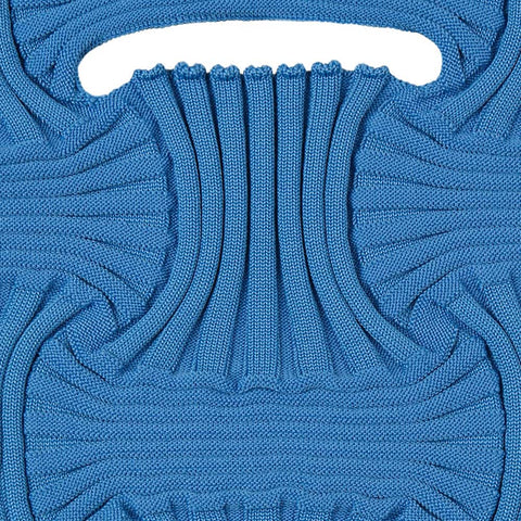 Textured elegance in every stitch—Bow Bag-Liberty Blue showcases sculptural knit pleats in a serene hue for a refined everyday statement