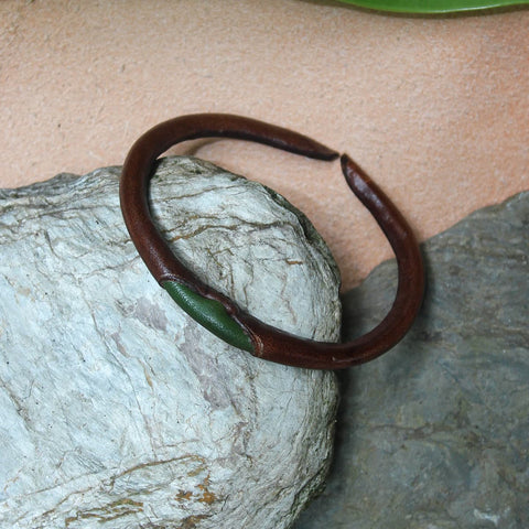 Top view of Papa craft ivory bracelet in brown olive colour which uses hand-dyeing process