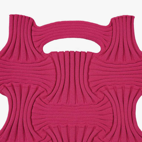 Sculpted knit detail up close—Bow Bag-Deep Pink showcases bold pleats, texture, and vibrant form in a statement-making everyday essential