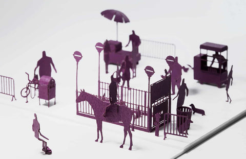 1/100 Architectural Model (People and Places)-No.6 New York—deep purple cutouts with matte, papery texture depict a lively urban street scene