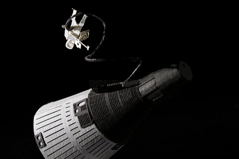 Close up view of architectural model featuring No.56 Gemini Spacecraft + Spacewalk with spacecraft and astronaut in silhouette in a 1/100 scale