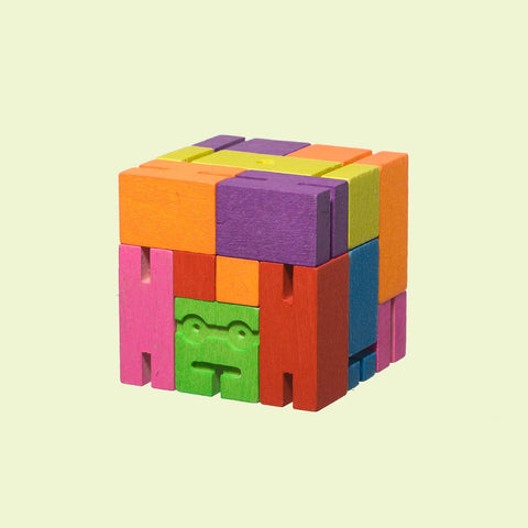 Classic Cubebots (Medium) folds into a compact cube of colorful wooden blocks—clever, space-saving design with playful, puzzle-like appeal