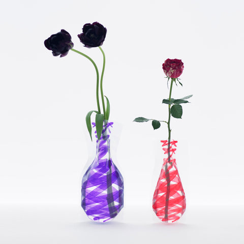 Grid bound flower vase design with spiralling red or purple colours, it comes in two sizes