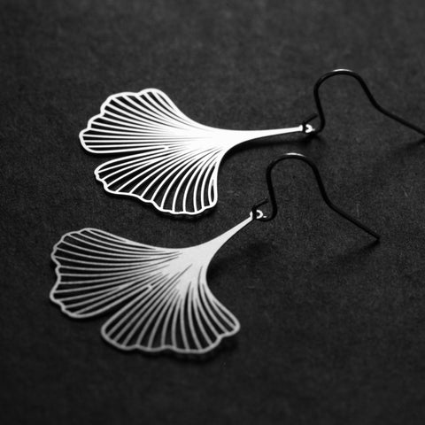 Close-up of Moorigin Stainless Steel Earrings-Ginkgo S Silver, showing delicate laser-cut ginkgo lines with a sleek, airy, nature-inspired design