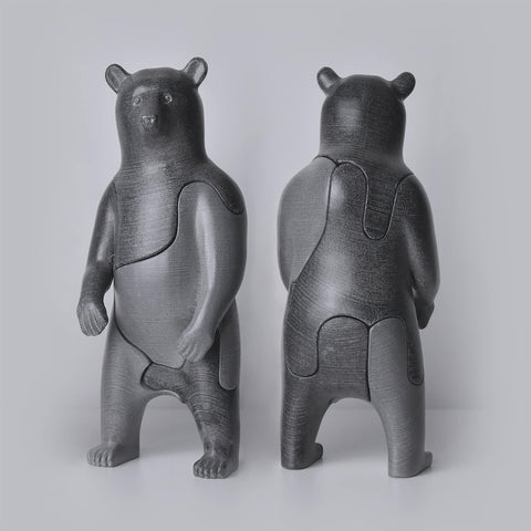 Locknester 3D Animal Puzzle-Bear in matte dark grey with a smooth layered texture, shown assembled front and back with subtle interlocking seams