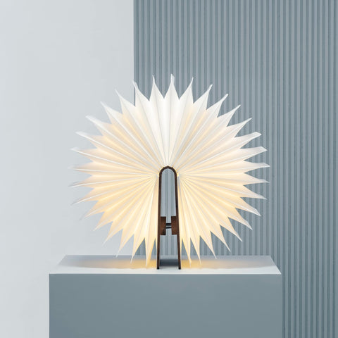 Lumio Lito Classic multi-functional Book Lamp which won a Red Dot Award displaying its 360 flexibility in a warm LED light