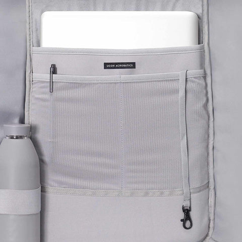 Interior view of Hajo Mini Backpack Lotus Series with a laptop compartment with two mesh pockets, bottle holder and key strap