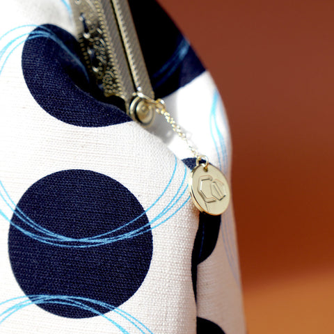 Cocoonese Kiss Clasp Handbag
