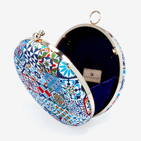 Cocoonese Round Hard Case Bamboo Handle Bag with peranakan tiles design showcasing the interior storage area