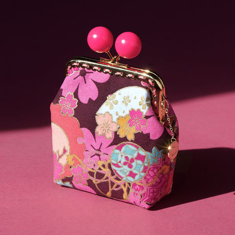 Side view of Cocoonese Clutch Purse Sakura Clouds (Pink) which is designed in Singapore comes with kiss-lock clasp and beautiful cotton fabrics