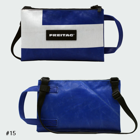 Front and back views of FREITAG F272 EDDIE crossbody bag, blue and white with blue handle and black strap.