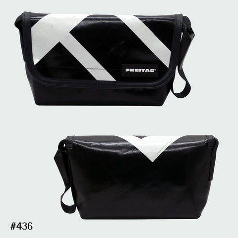 FREITAG F41 Hawaii Five-O messenger bag in black with white stripes, upcycled truck tarp, front and back views.