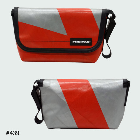 FREITAG F41 Hawaii Five-O messenger bag in silver with red diagonal stripe, upcycled truck tarp, front and back views.