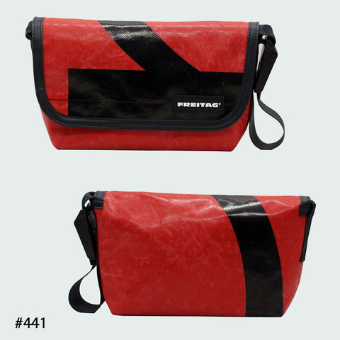 FREITAG F41 Hawaii Five-O messenger bag in red with bold black graphic, upcycled truck tarp, front and back views.