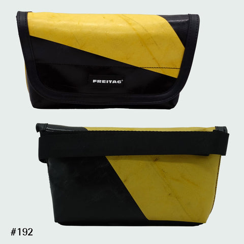 FREITAG F40 Jamie hip bag in yellow and black with diagonal colorblock, upcycled truck tarp belt bag, front and back views.